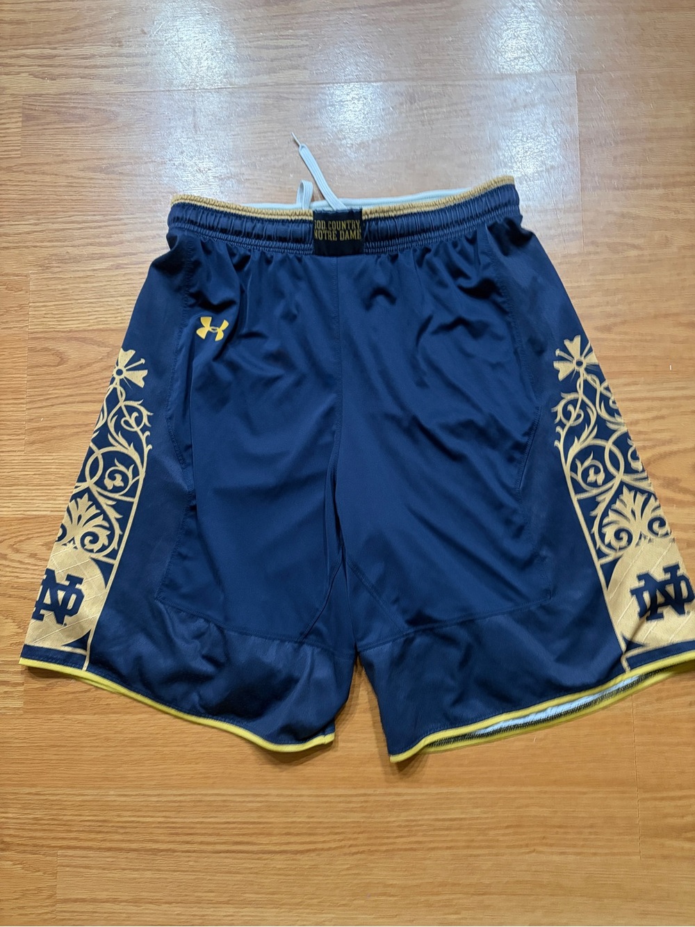Under Armour Navy and Gold Athletic Shorts with Decorative Side Panels